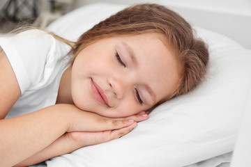 Adorable sleeping little girl, close up