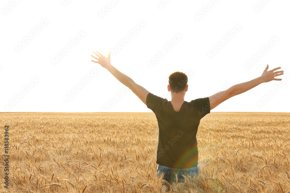 Sticker man enjoying beauty of wheat field