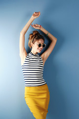 Naklejka premium Beautiful girl on blue background