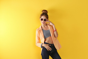 Beautiful girl on yellow background