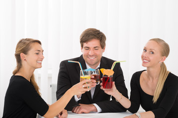 Group Of Friends Drinking Cocktails