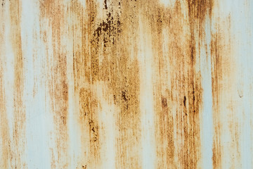Rusty on white iron gates/plate that had been left to decay of a house in the city. abstract background texture