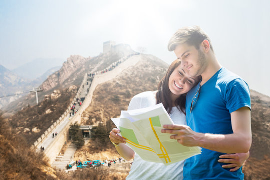 Young Couple Looking At Map