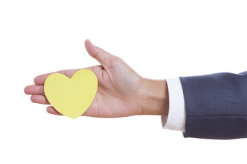 Businessman hand holding paper heart, isolated on white background. with using path 