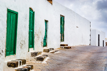 Street with green doors in Teguise.  Lanzarote. Canary Islands. Spain © alexanderkonsta
