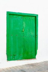 Green old door in Teguise.  Lanzarote. Canary Islands. Spain
