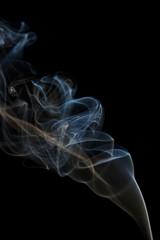 Abstract blue smoke from aromatic sticks.