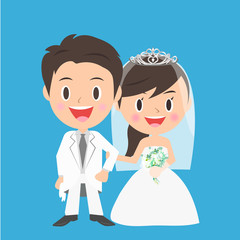 結婚式で腕を組む新郎新婦