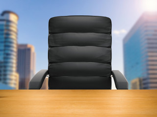 wooden table with 3d rendering office chair on office building background