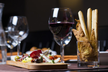 Antipasto and catering platter with different meat and cheese products