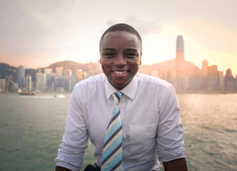 Smiling young businessman posing for a picture