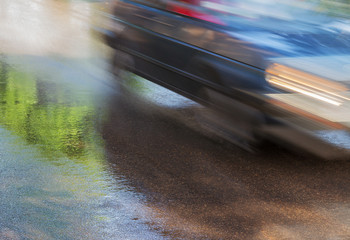 Reflection on slippery road.