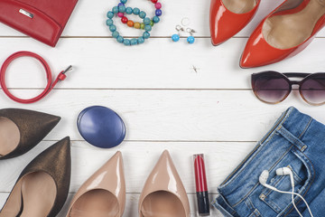 Women clothing set and accessories on light background.Top view