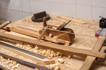 carpenter working,hammer,meter and screw-driver on construction