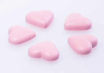 Obraz na płótnie Canvas chocolate in pink colour or love shape chocolate.