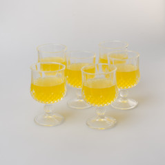 Orange juice in glasses on white background.