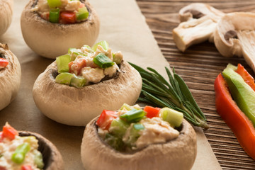 Healthy eating and diet concept - baked mushrooms with paprika