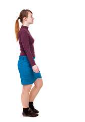 back view of walking  woman. beautiful blonde girl in motion.  backside view of person.  Rear view people collection. Isolated over white background. Girl with red hair tied in a pigtail passes.