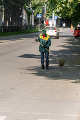 Janitor on a city street.