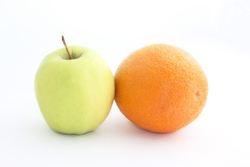 Yellow Apple and orange on a white background