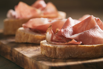 simple ciabatta slices with speck ham