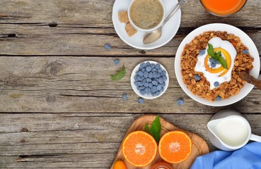 Homemade granola or muesli. Healthy breakfast with text space, top view. Health and diet concept.