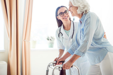 Nice doctor with disabled woman
