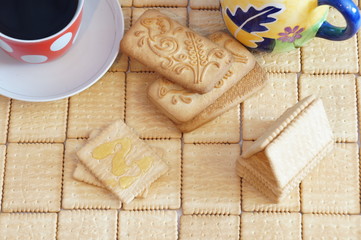 Obraz na płótnie Canvas Cracker house and crackers with honey for breakfast. Crackers with coffee.