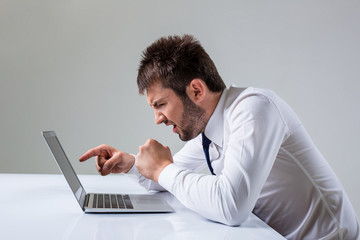 emotional man and laptop