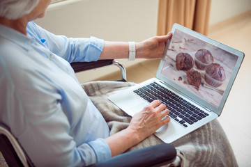 Senior female patient using computer