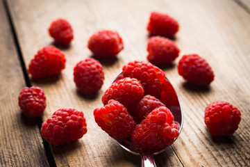 Raspberry on the rustic wooden table