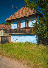 Traditional old wooden carved gate in Atyha, Transylvania, Romania