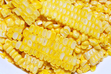 diced cooked  corn  on white background