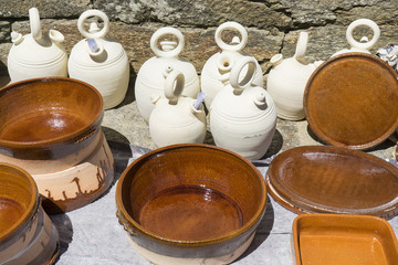 Tapas, dishes and crocks in a medieval fair, kitchenware handmad