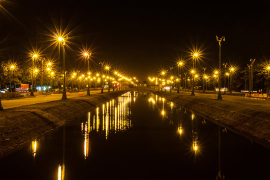 Electric light in perspective canal, Night view background.