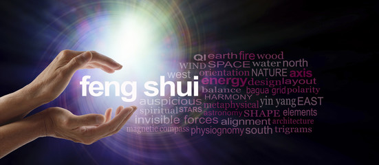 Shedding light on Feng Shui - Female hands cupped around the words FENG SHUI surrounded by a...