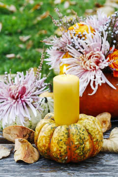 Candle in pumpkin, beautiful garden decoration.