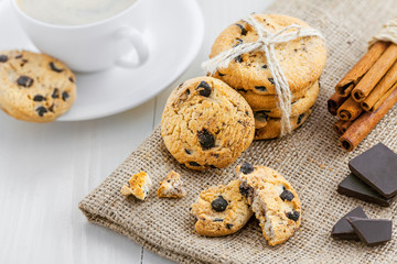 Fresh baked chip cookies for dessert. Delicious biscuits with coffee.