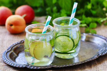 Healthy water with cucumber, zingiber and mint.