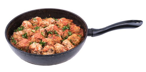 Stewed meatballs in a pan isolated on white background.