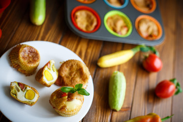 zucchini muffins baked with egg inside