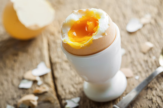 Perfect soft boiled egg on a table. Traditional healthy food.