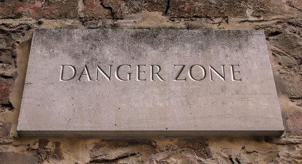 Danger zone. Engraved text.