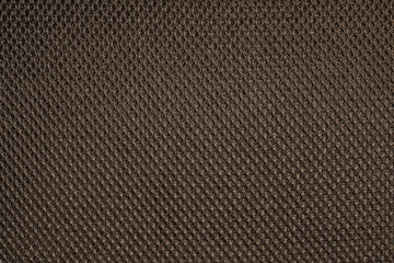 Brown fishnet cloth material as a texture background. Nylon texture pattern or nylon background for...