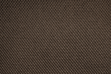 Fototapeta premium Brown fishnet cloth material as a texture background. Nylon texture pattern or nylon background for design with copy space for text or image.