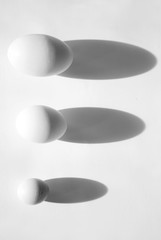 Three eggs of different sizes