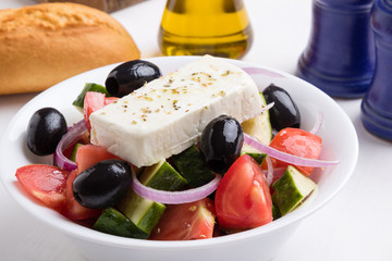 greek salad in white bowl