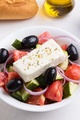 greek salad in white bowl