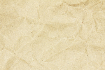 Recycled crumpled brown paper texture or paper background for design with copy space for text or image.
