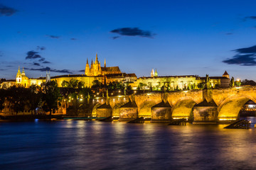 Fototapeta premium Scenic summer evening view of the Old Town ancient architecture and Vltava river pier in Prague, Czech Republic